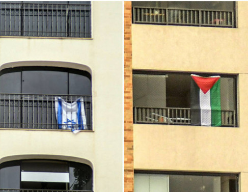 Sacadas de apartamentos em São Paulo exibindo bandeiras de Israel e da Palestina. 