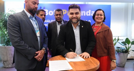 Assinatura de convênio com a Caixa