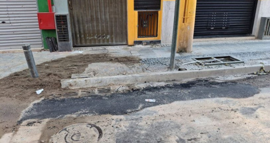 Buraco foi tampado na Rua Carlos Lacerda 