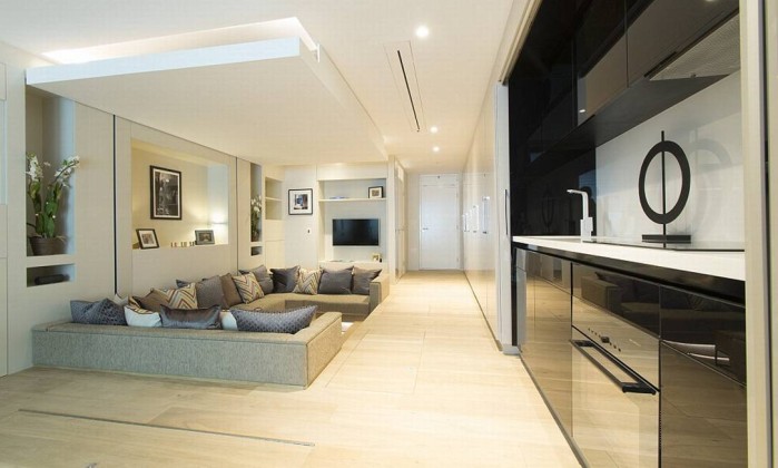 2B8654CE00000578-3204956-Upon_opening_some_full_length_cabinet_doors_a_compact_kitchen_un-a-5_1440144162893