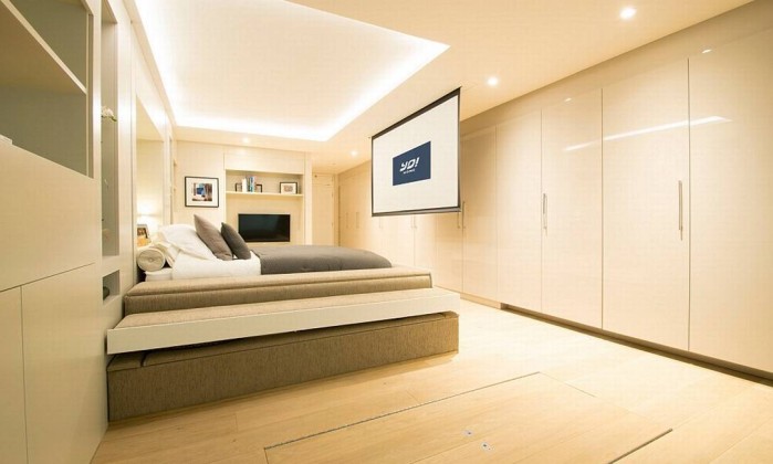 2B8654EF00000578-3204956-Another_feature_is_a_king_size_bed_which_lowers_from_the_ceiling-a-3_1440144162862